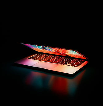 A Laptop half-open, ready for a task