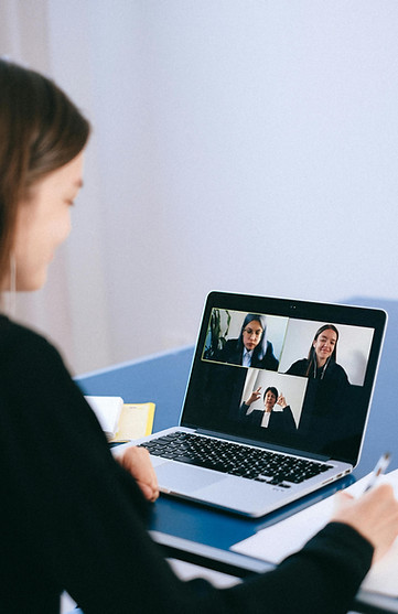 Tutor on the video call with the students