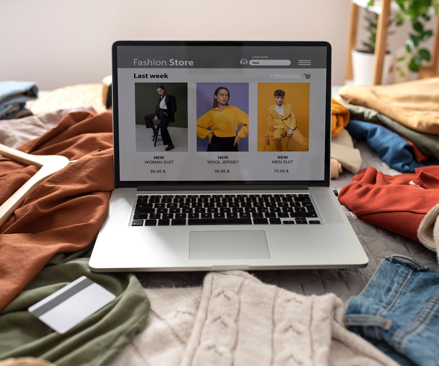 high-angle-clothes-bed-fast-fash.jpg