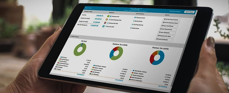 Hands holding a tablet that displays a payroll dashboard with donut charts for net cash, employee tax liability, and employer tax liability.