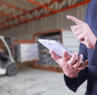 A person managing factory on their ipad
